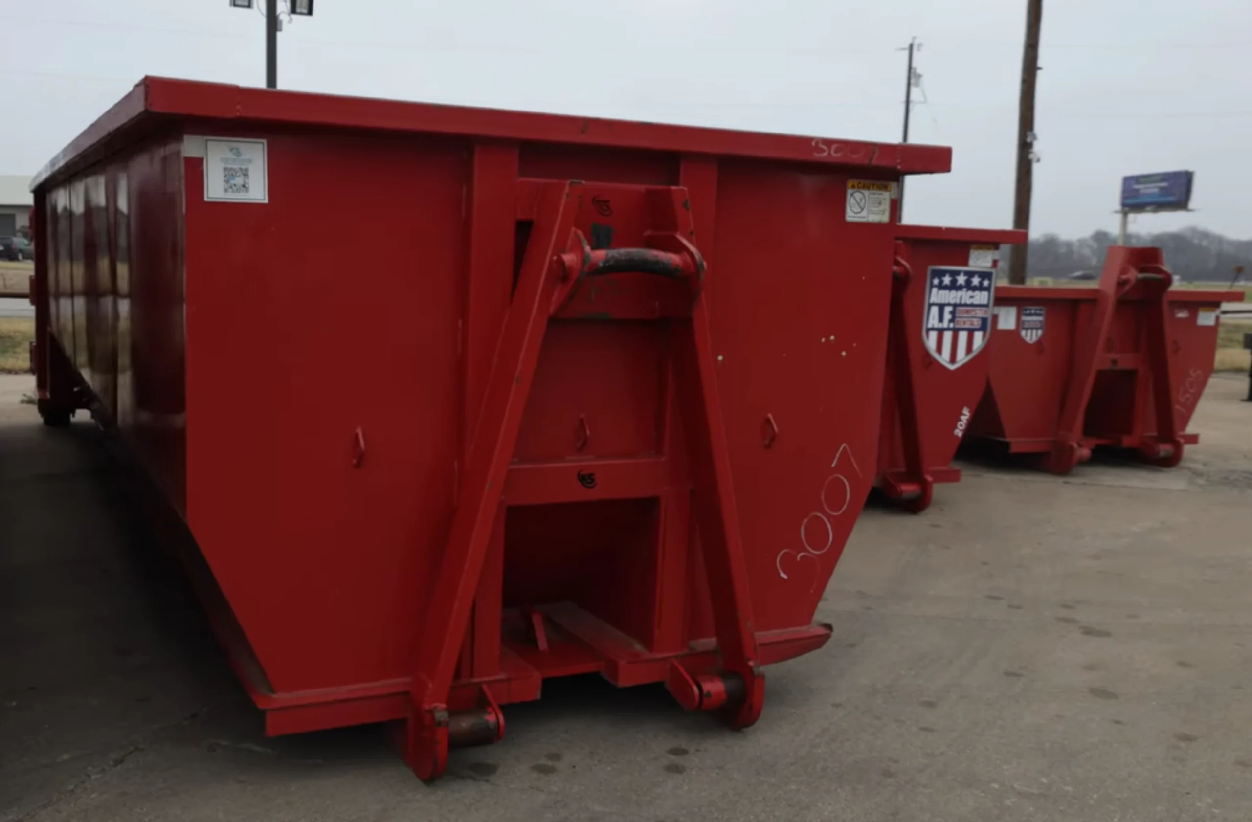40-yard red roll-off dumpster New Braunfels TX Veramendi Mayfair construction I-35 Comal County